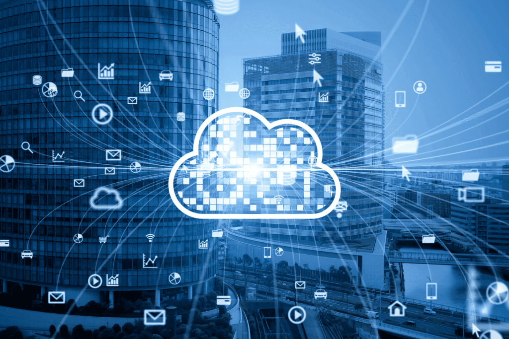 Cloud computing icon overlay on a city skyline with connected digital network symbols.